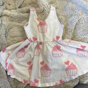 Monica and Andy pink cupcake heart dress.